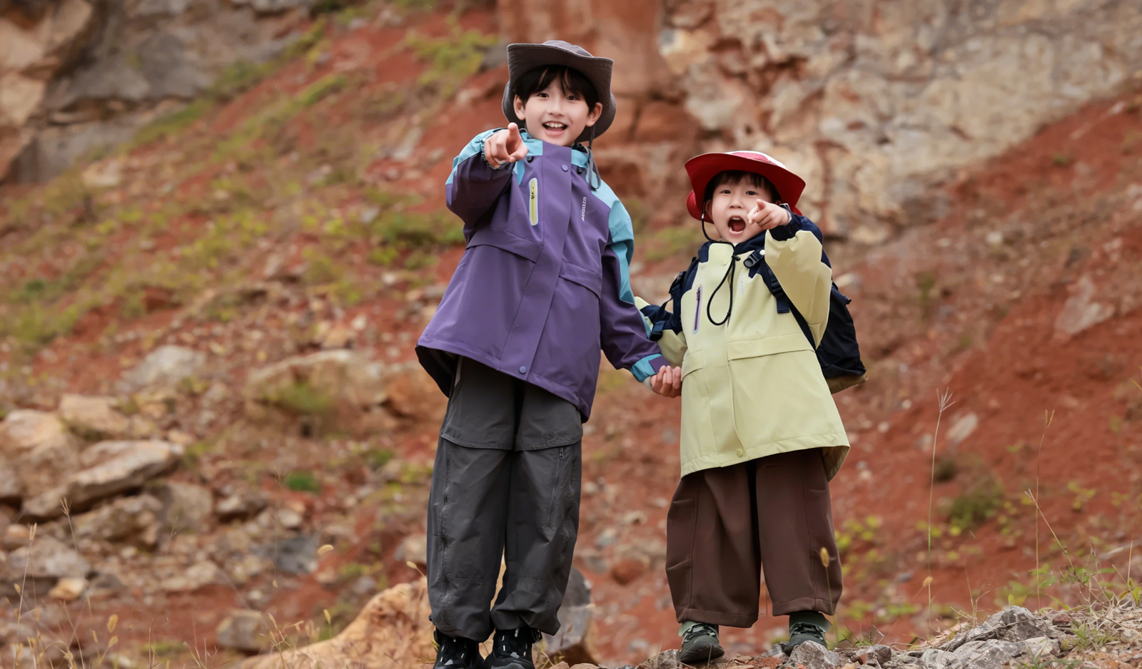 Boys wearing adventure-ready outdoor clothing